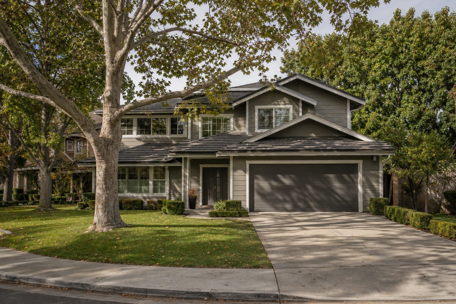 Two-story contemporary home on tree-lined cul-de-sac with mature oaks in Northridge Estates.