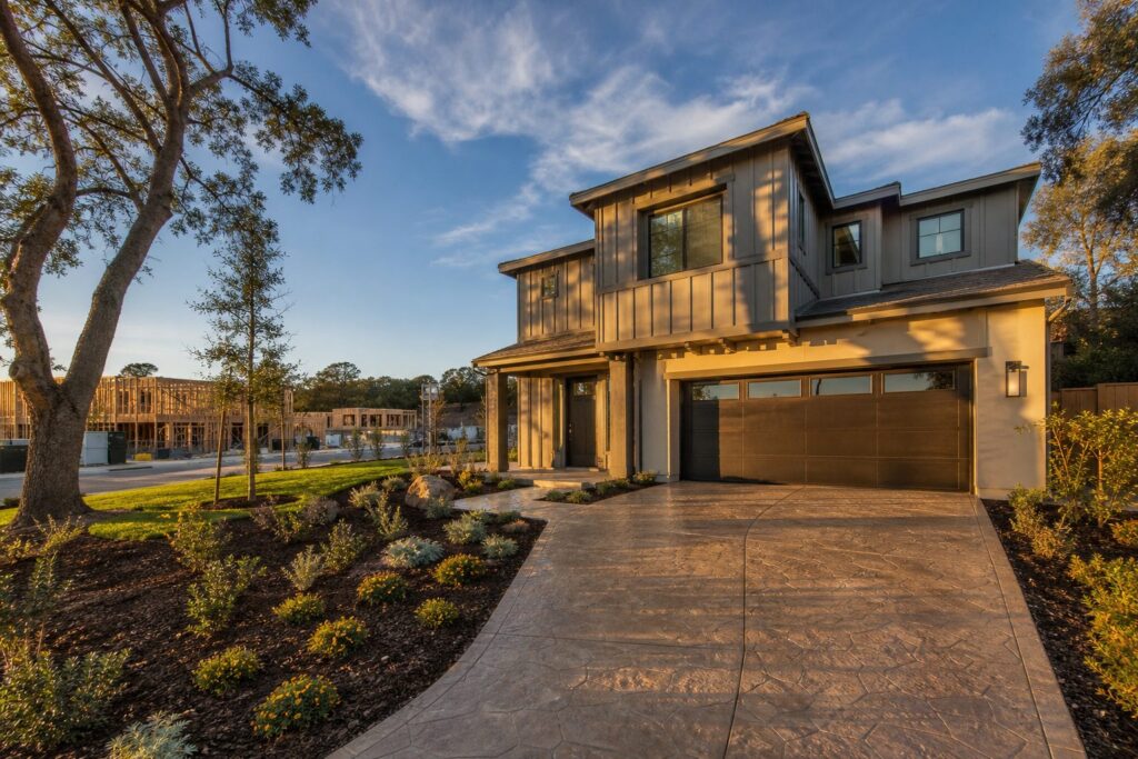 New two-story contemporary home with board-and-batten siding in active Tesoro Highlands development community in Valencia.